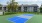 a large building with a tennis court