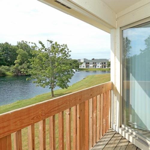 Generous balconies a deck overlooking a lake
