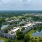 a river with buildings and trees