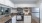 a kitchen with white cabinets